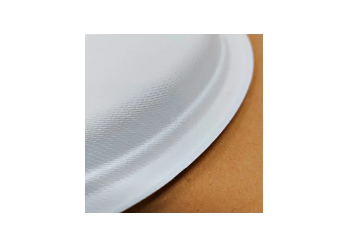 Round 7mm compostable plate crafted from sugarcane fiber