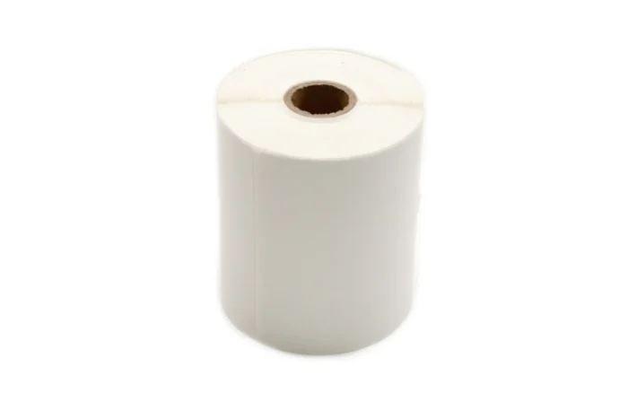a cylindrical roll of adhesive labels designed shipping needs