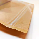 Kraft and clear-sided stand-up pouches, 14g, featuring a zip closure for fresh storage and clear visibility of contents.